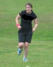 Woman running up a hill