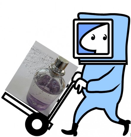 Picture of man in protective suit pushing a trolley with a perfume bottle on it