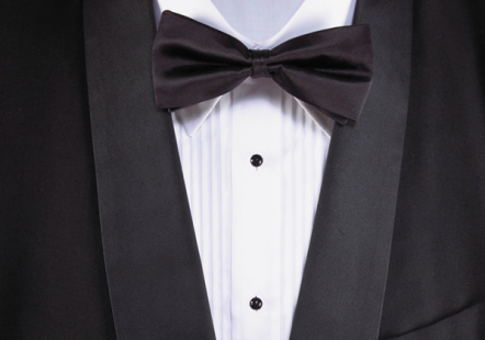 Black tuxedo with white shirt.