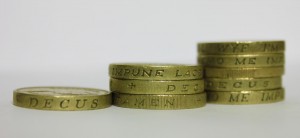Three stacks of pound coins