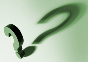 Green question mark on green background with shadow