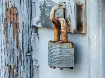 Metal lock on a wooden door