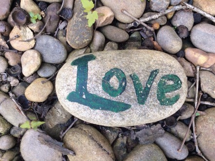 stone with the word love written on it
